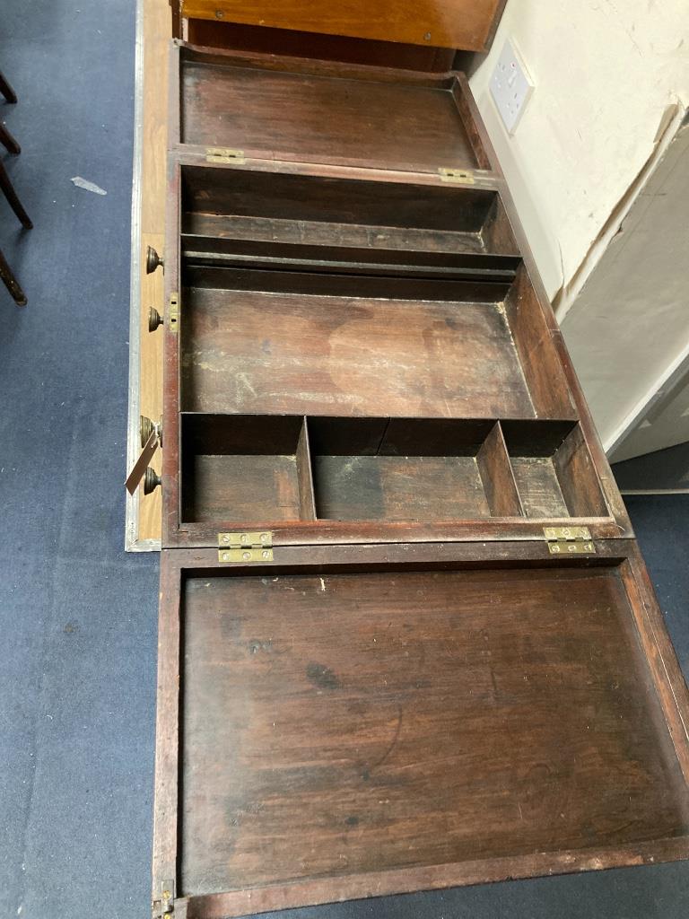 A George III satinwood banded mahogany enclosed wash stand, width 61cm, depth 51cm, height 88cm